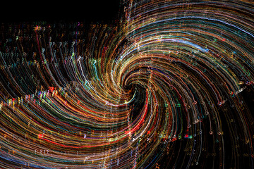 City lights spiral in a long exposure rotated image