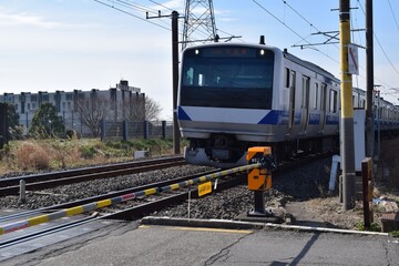 Obraz premium 鉄道線路の踏切