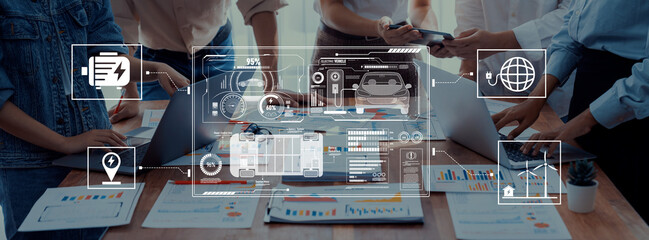 A diverse team collaborates on technology and data analysis in an office, surrounded by laptops and digital interfaces displaying graphs, enhancing productivity and innovation. Trope