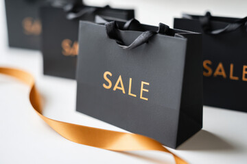 Elegant black shopping bags with sale promotion