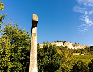 Stone cross in a landscape