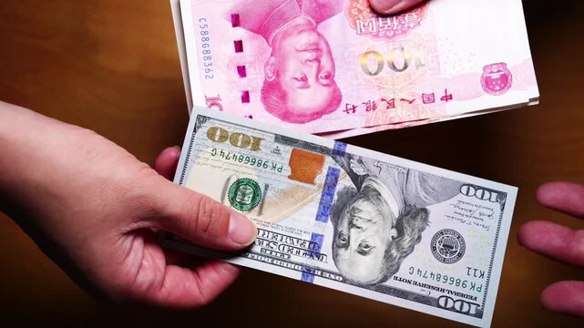 Animation of Chinese Yuan (RMB) bills seamlessly transforming into US Dollar (USD) bills, symbolizing currency exchange and financial fluidity.