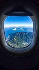 High-altitude view of mountains and ocean