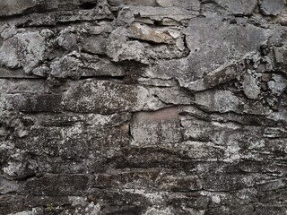 Background of very old stone wall texture photo