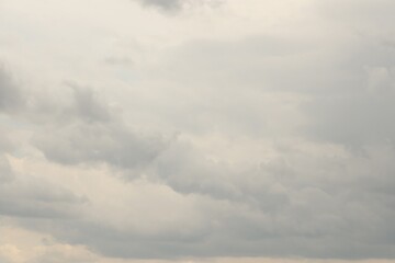 Blue sky with scattered white cumulus clouds