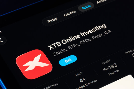 XTB Online Investing listing captured on iPad, Apple Liquid Glass look in iOS 26 highlights refreshed UI and typography. Stafford, United Kingdom, September 29, 2025.