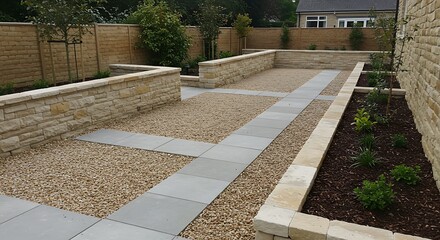 Obraz premium Well maintained backyard design with stone walls and gravel pathways