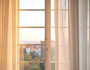 Warm morning light filters through sheer curtains and a window with white frames, revealing a blurred urban landscape outside. Peaceful home interior.