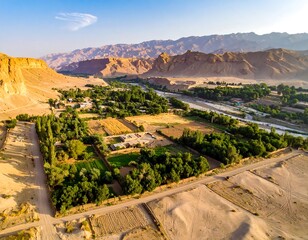 High-angle view of a valley with cultivated land and a river