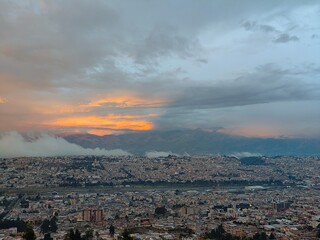 clouds over the city accompanied the evening glow