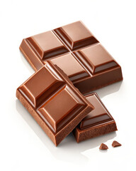 Fototapeta premium Delicious Milk Chocolate Bar Pieces Scattered on a Clean White Background.