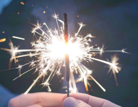 Sparkler held in hand - Powered by Adobe