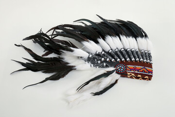 Traditional warbonnet (Native American chief headdress) isolated on white