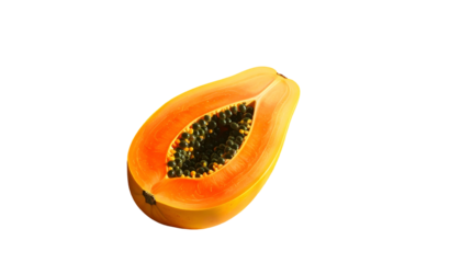 Half papaya, vibrant orange flesh with seeds, isolated on black