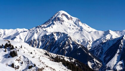 Snowy mountain peak under a clear sky