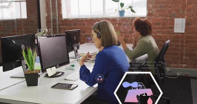 Analyst typing swiping pointing cycling sweeping bar chart icons at desk for analyzing tech stats