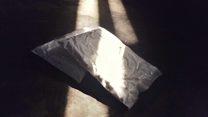 Fototapeta premium two pieces of tempeh, dark background