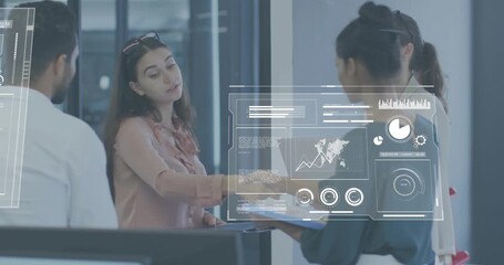 Two women shaking hands at reception, activating holographic charts and maps for business review - Powered by Adobe