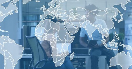 On pointing laptop screen and tapping tablet, world map appearing showcasing global business scope - Powered by Adobe