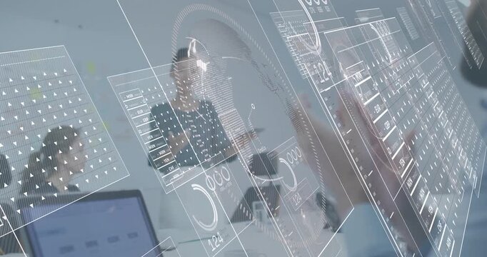 Presenter tapping tablet causing holograms with male hand adjusting charts for business recap