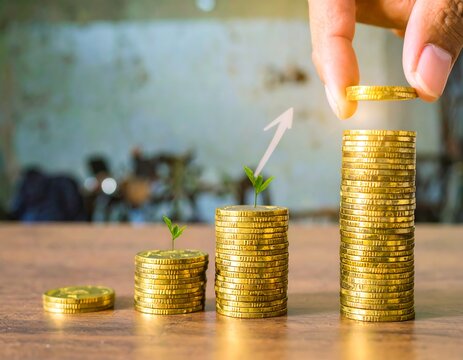 Stacks of gold coins growing