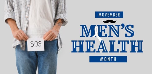 Young man holding paper with word SOS on light background, closeup. November - men's health month