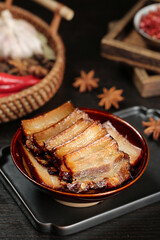 Smoked Pork Belly Pancetta Slices with Caramelized Glaze in Rustic Kitchen Setting
