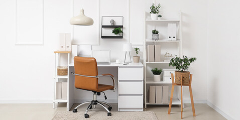 Comfortable workplace with laptop in modern office