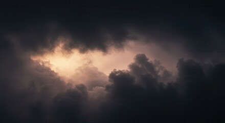 Fototapeta premium Dramatic dark clouds fill the frame with an opening of light.