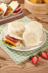 Bear Claw Paw Print Sandwich Buns with Filling on Wooden Table