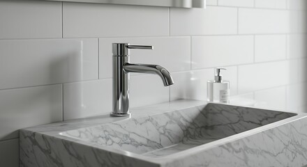 Modern bathroom faucet with marble sink and tiled wall detail