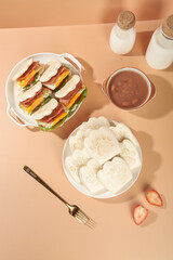 Adorable Bear Paw Sandwich Buns and Cookie Meal Set with Milk Bottles on Warm Background