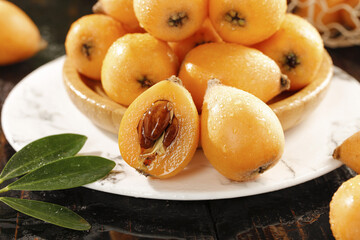Fresh Loquat Fruits from Yunnan Mountains China Subtropical Orange Fruit on White Plate