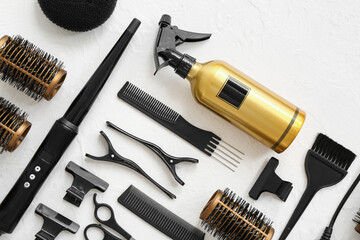 Different hairdresser's accessories on white background