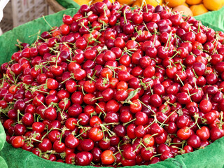 Fresh Red Cherries with Stems in Market Display - Dalian Shandong China Fruit Harvest