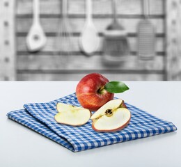 Fototapeta na wymiar Red fresh ripe apple on desk