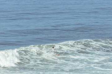 Naklejka premium Surfer