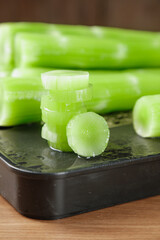Fresh Cucumber Slices on Cutting Board - Healthy Vegetable Preparation for Cooking