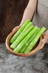 Fresh Celery Sticks in Wicker Basket - Healthy Green Vegetable Preparation