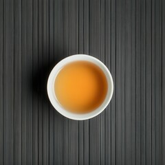 Warm Herbal Tea in White Cup on Dark Wooden Table Surface