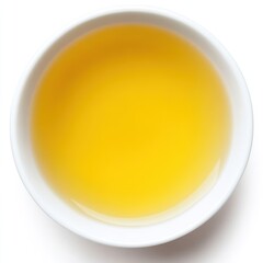 Transparent Yellow Liquid in White Bowl Isolated on White Background