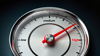 A speedometer with readings for low, medium, and high, and the needle is pointing exactly between medium and high