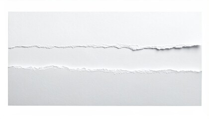 Close-up view of torn white paper revealing a textured, ragged edge