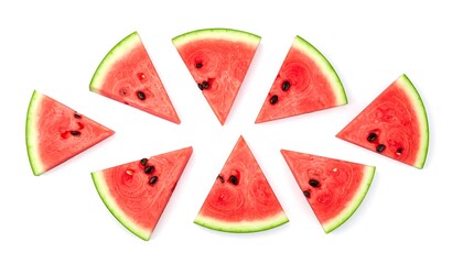 Overhead shot showcasing eight watermelon wedges arranged in a circular pattern against a bright white backdrop