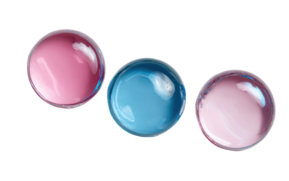 Three translucent spheres, pale pink, light blue, and light mauve, arranged in a diagonal line against a transparent background