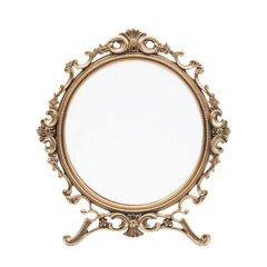 Ornate antique vanity mirror with intricate golden frame on a white background