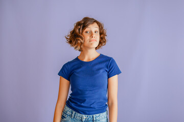 Confused young child expressing misunderstanding with stressed expression and anxious vibe for...