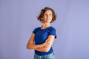 Strong smiling female student presenting assertive gesture with proud expression for inspiration on...