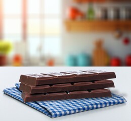 Tasty sweet chocolate in modern room