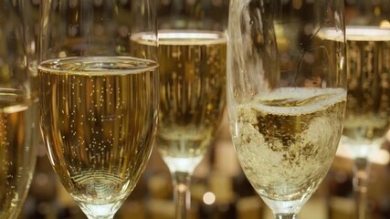 Champagne flutes fill with sparkling bubbly creating celebration atmosphere enhancing mood - Powered by Adobe